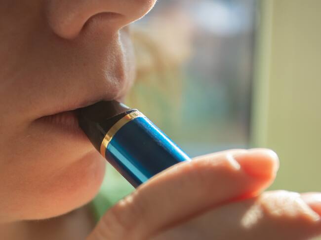 vaper smokes vape, smoke from electronic cigarettes, harm to health
