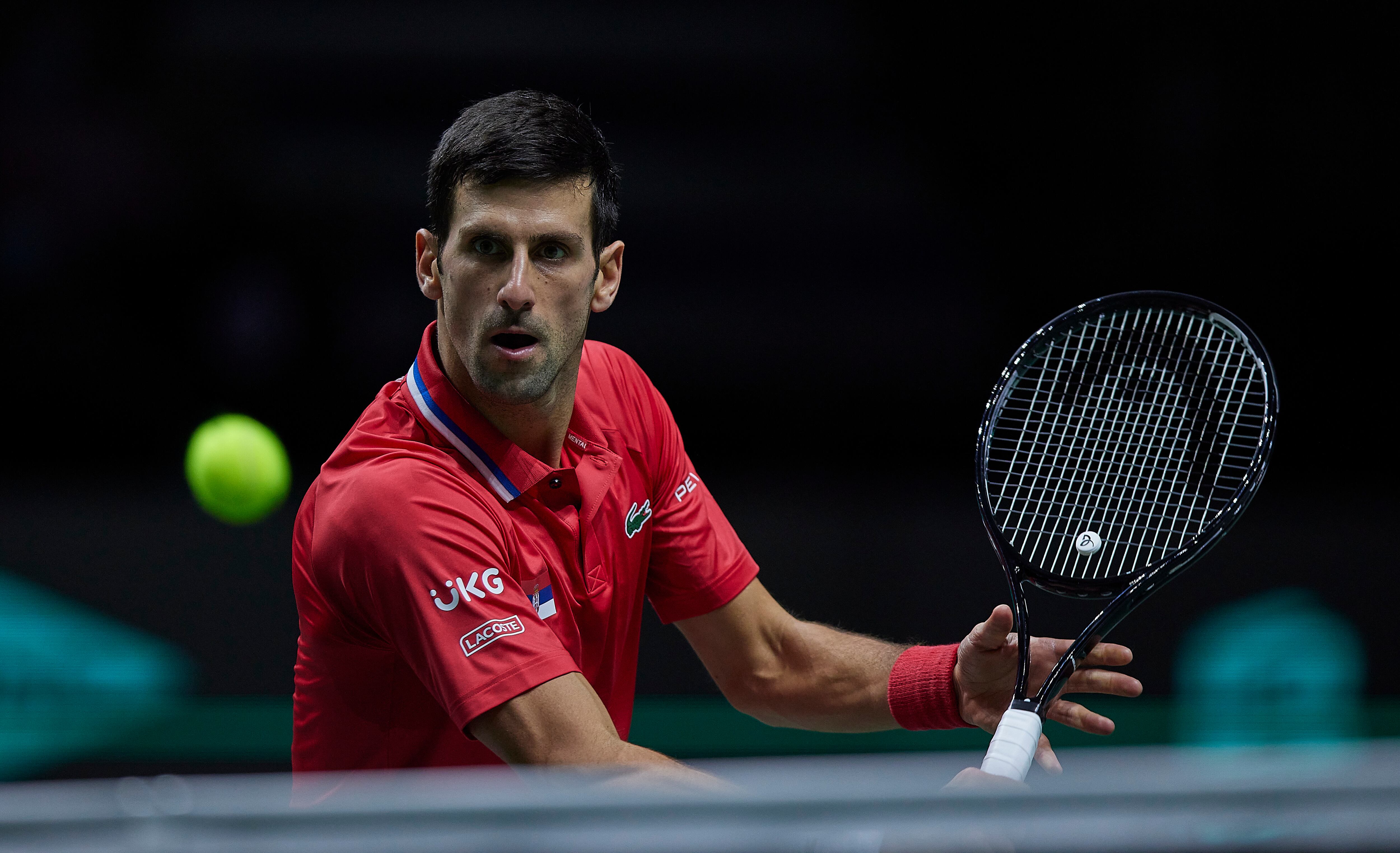 MADRID, SPAIN - DECEMBER 01: (BILD OUT) Novak Djokovic of Serbia plays a backhand in the match against Alexander Bublik of Kazakhstan during the Davis Cup Finals 2021 - Quarter Final match between Serbia and Kazakhstan at Madrid Arena on December 1, 2021 in Madrid, Spain. (Photo by Berengui/DeFodi Images via Getty Images)