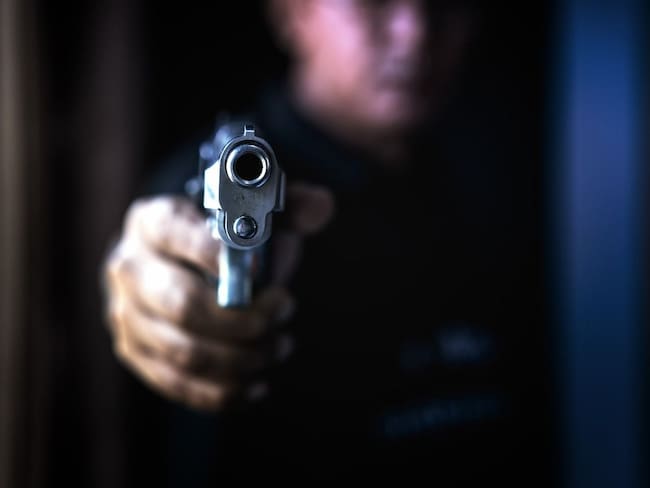 Imágen refencia de arma apuntando. Foto: Getty Images