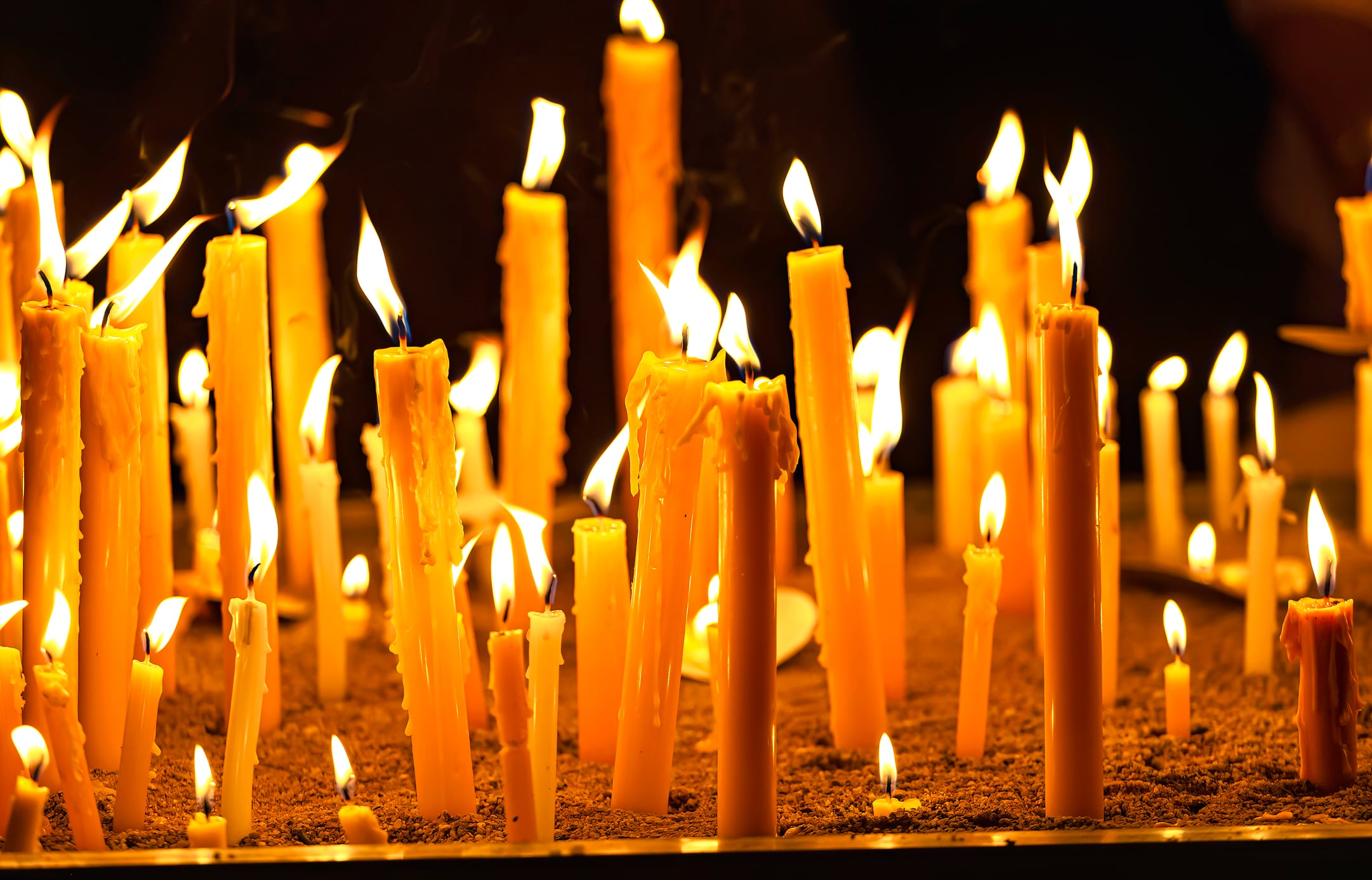 Close-up of candle burning for celebrations