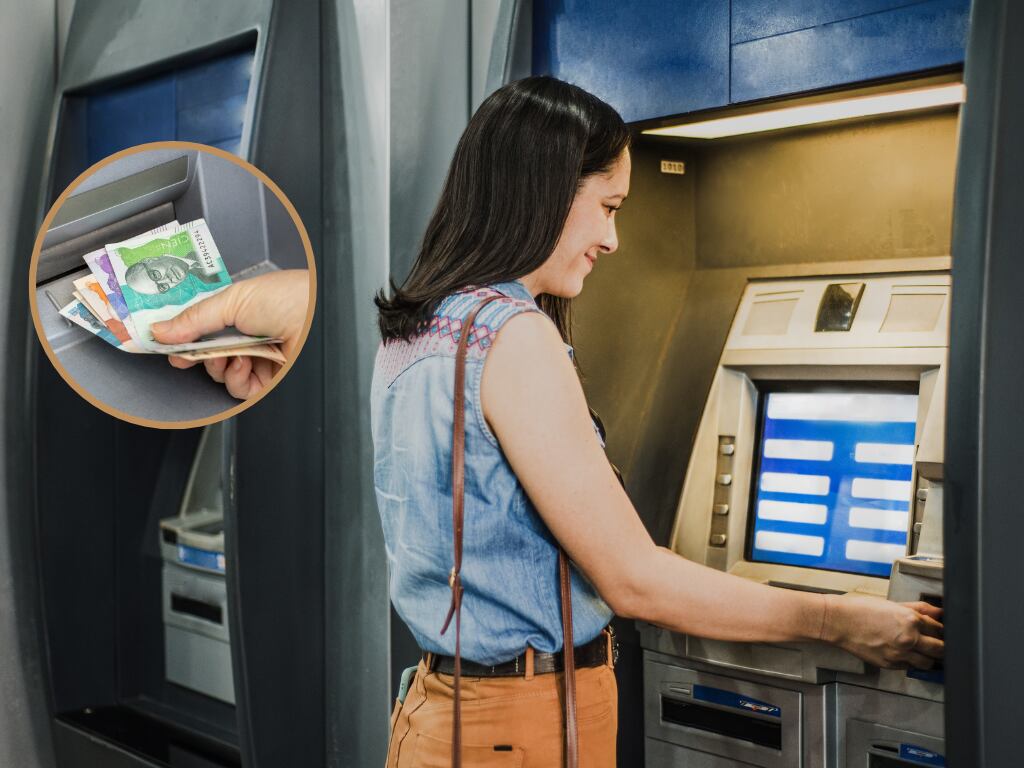 Mujer retirando billetes colombianos a través de un cajero electrónico (Fotos vía Getty Images)