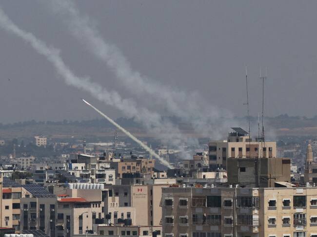 Rockets are fired from Gaza City towards Israel, on May 10, 2023. Israel's army and Gaza militants traded heavy cross-border fire on May 10, with 22 Palestinians killed over two days amid the worst escalation of violence to hit the coastal territory in months. (Photo by Mahmud HAMS / AFP) (Photo by MAHMUD HAMS/AFP via Getty Images)