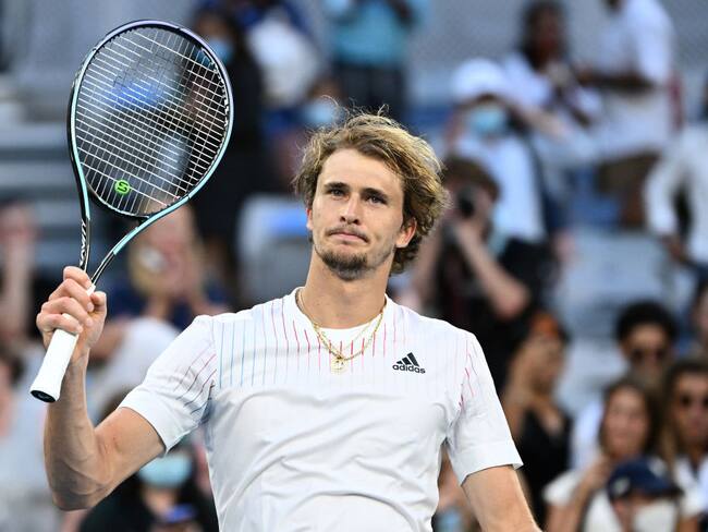 MELBOURNE, AUSTRALIA - JANUARY 21: Alexander Zverev of Germany celebrates match point in his third round singles match against Radu Albot of Moldova during day five of the 2022 Australian Open at Melbourne Park on January 21, 2022 in Melbourne, Australia. (Photo by Quinn Rooney/Getty Images)