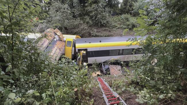 A derailed train is pictured near Riedlingen near Biberach an der Riss on July 27, 2025. The derailment of a passenger train in southwestern Germany on July 27, 2025 evening resulted in at least three deaths and several injuries, according to the latest report communicated by federal police to AFP. (Photo by NonStopNews / AFP)