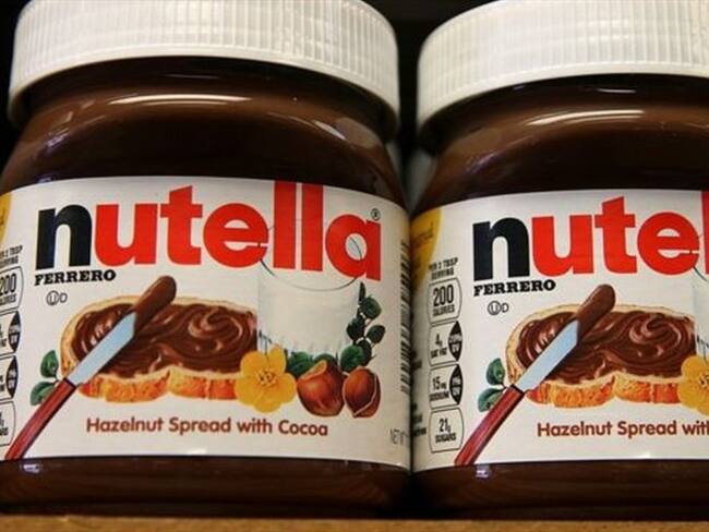 Inicialmente la Nutella se consumía como cobertura de postres, pero ahora la mayoría de sus fanáticos la unta en sus panes o tostadas, según Ferrero.. Foto: BBC Mundo