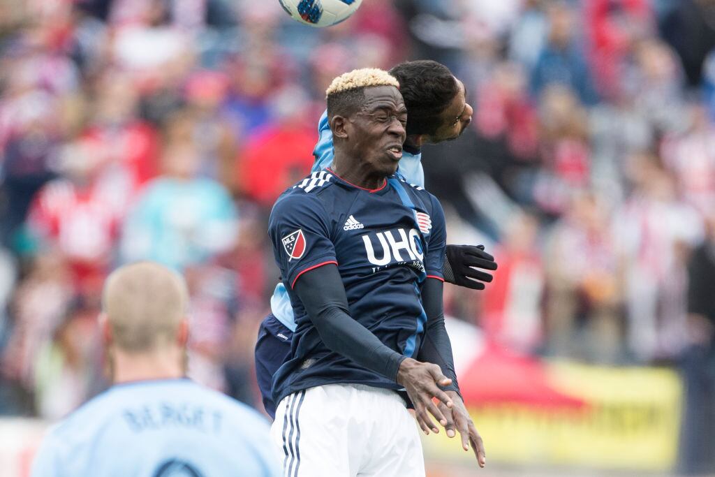 Wilfried Zahibo #23 of New England Revolution and Yangel Herrera #30 of New York City  (Photo by Tim Clayton/Corbis via Getty Images)