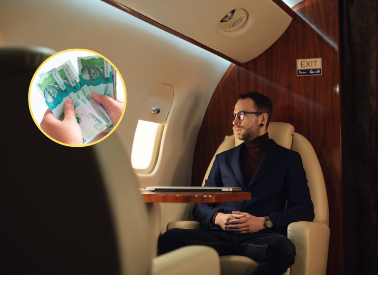 Persona en un jet privado disfrutando de su vuelto / Billetes de 100.000 pesos colombianos  (Getty Images)