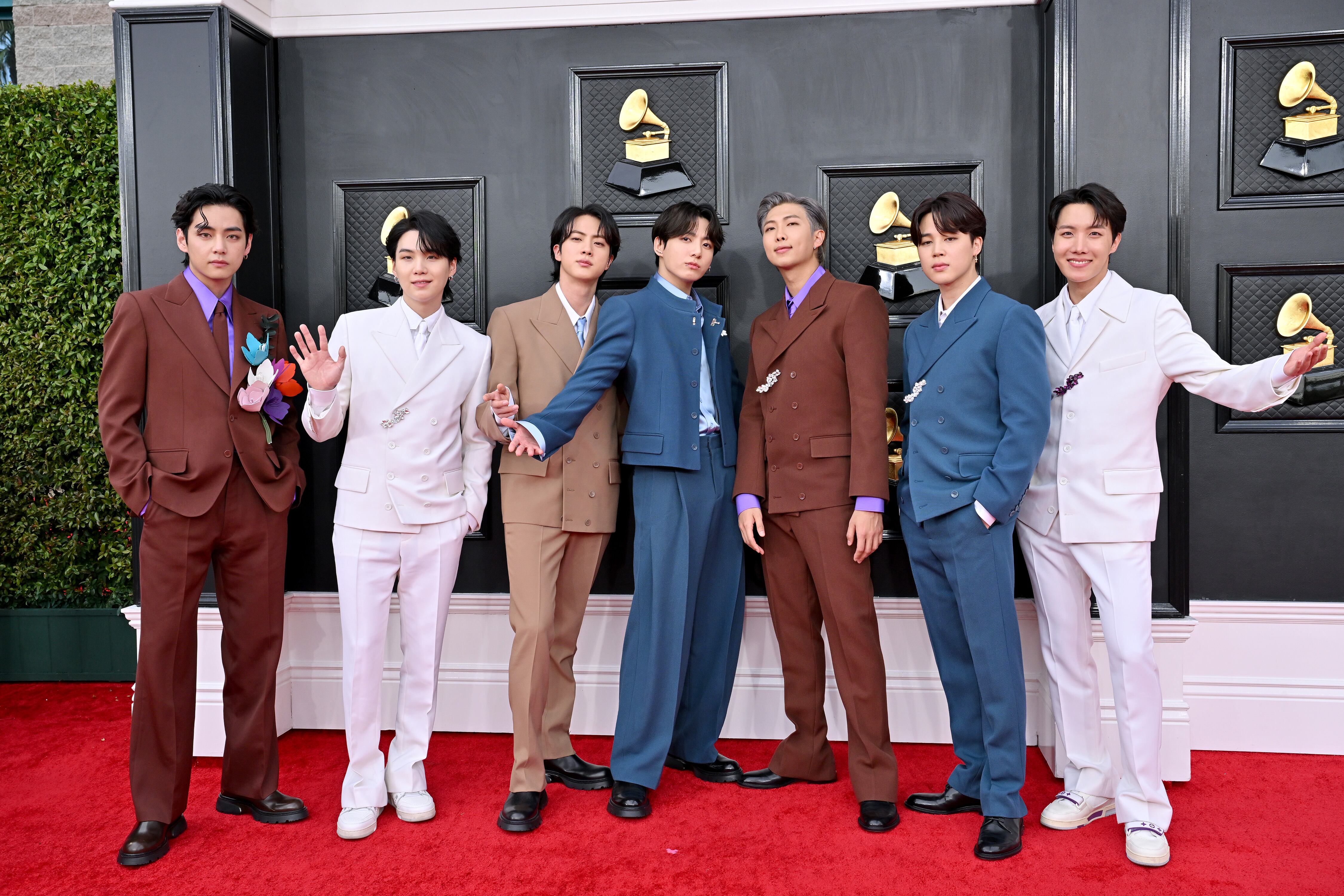 LAS VEGAS, NEVADA - APRIL 03: (L-R) V, Suga, Jin, Jungkook, RM, Jimin and J-Hope of BTS attends the 64th Annual GRAMMY Awards at MGM Grand Garden Arena on April 03, 2022 in Las Vegas, Nevada. (Photo by Axelle/Bauer-Griffin/FilmMagic)