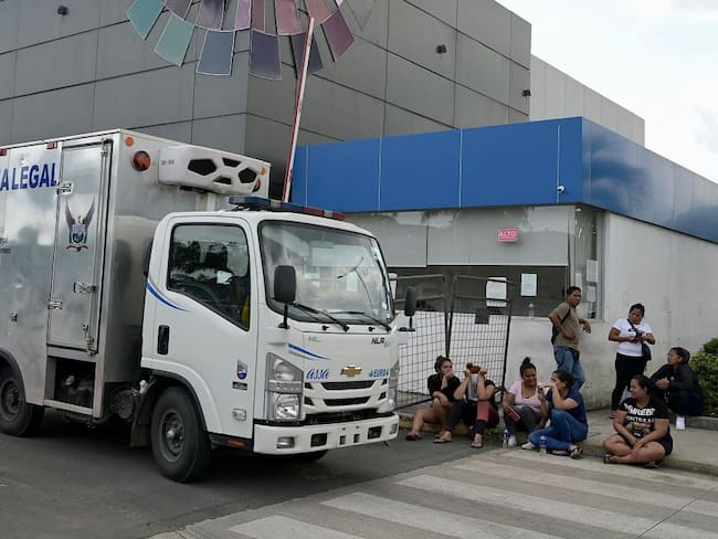 Relatives of inmates wait for information outside Medicina Legal in Guayaquil, Ecuador, on April 15, 2023, after clashes broke out in the Guayas 1 prison. - At least 12 inmates were killed in fresh clashes that broke out in a prison in the Ecuadoran port of Guayaquil, the prosecutor's office said Saturday, the latest deadly violence to rock the city's penitentiaries. (Photo by Marcos Pin / AFP) (Photo by MARCOS PIN/AFP via Getty Images)