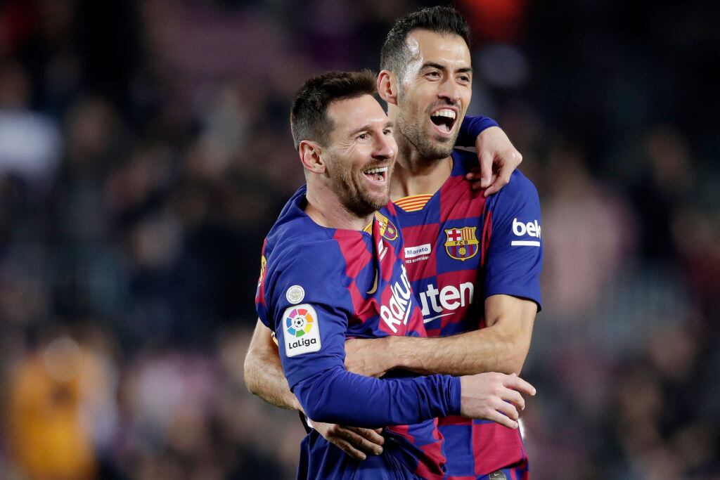 Lionel Messi y Sergio Busquets en el Barcelona. Diciembre 7 de 2019. Foto: David S. Bustamante/Soccrates/Getty Images.