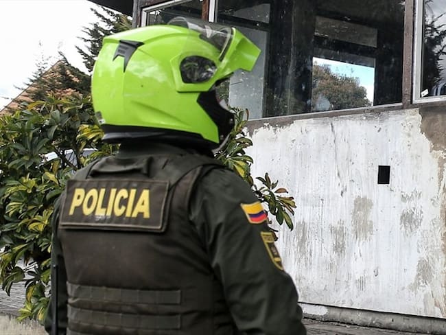 Imputado policía por muerte de dos personas en disturbios en Bogotá. Foto: Colprensa - Álvaro Tavera
