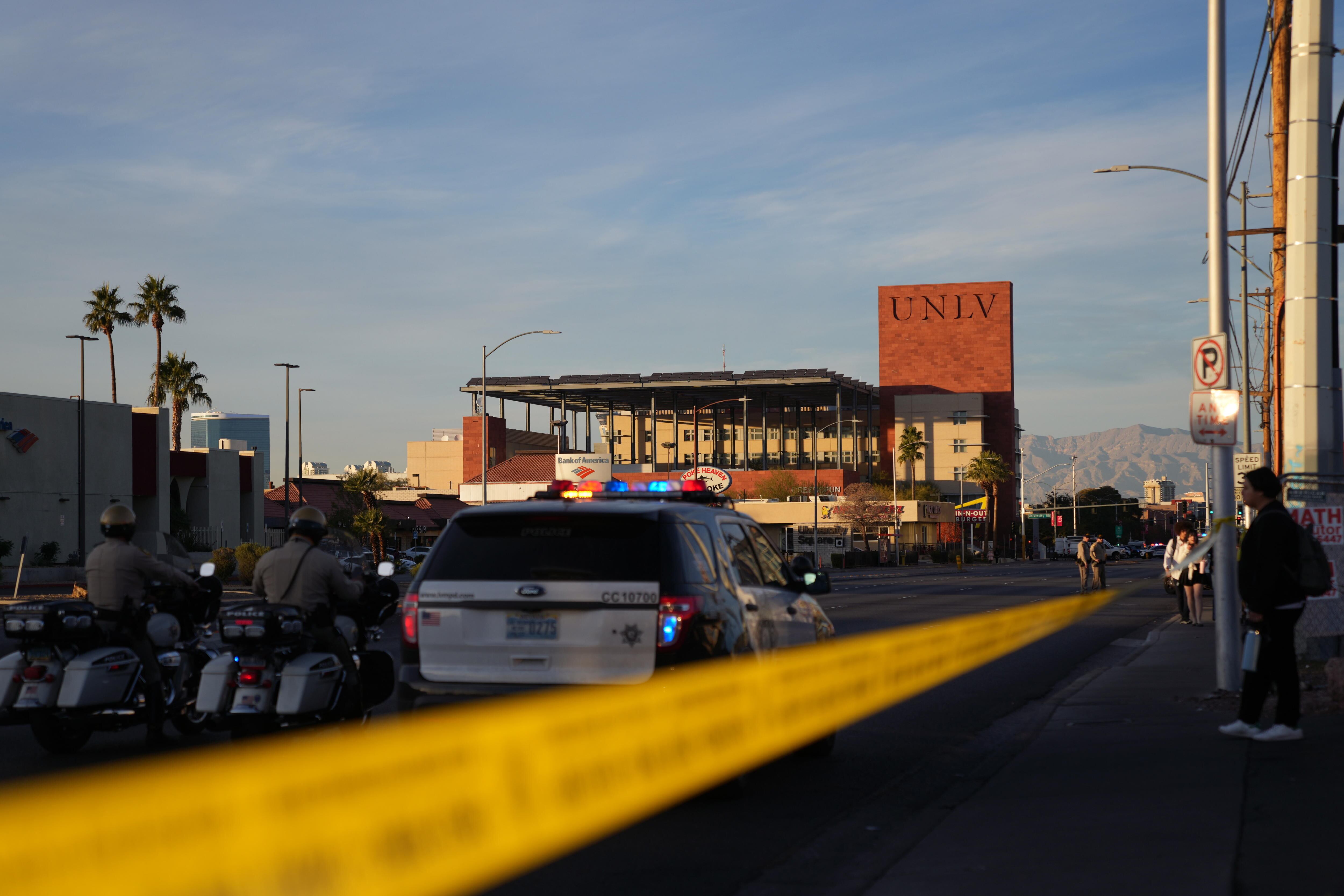 Las Vegas (United States), 07/12/2023.- Police close a road outside of the University of Nevada where multiple people were shot on the campus in Las Vegas, Nevada, USA, 06 December 2023. According to local police at least three people were killed with a fourth in critical condition, and the suspect was located and is deceased. EFE/EPA/ALLISON DINNER