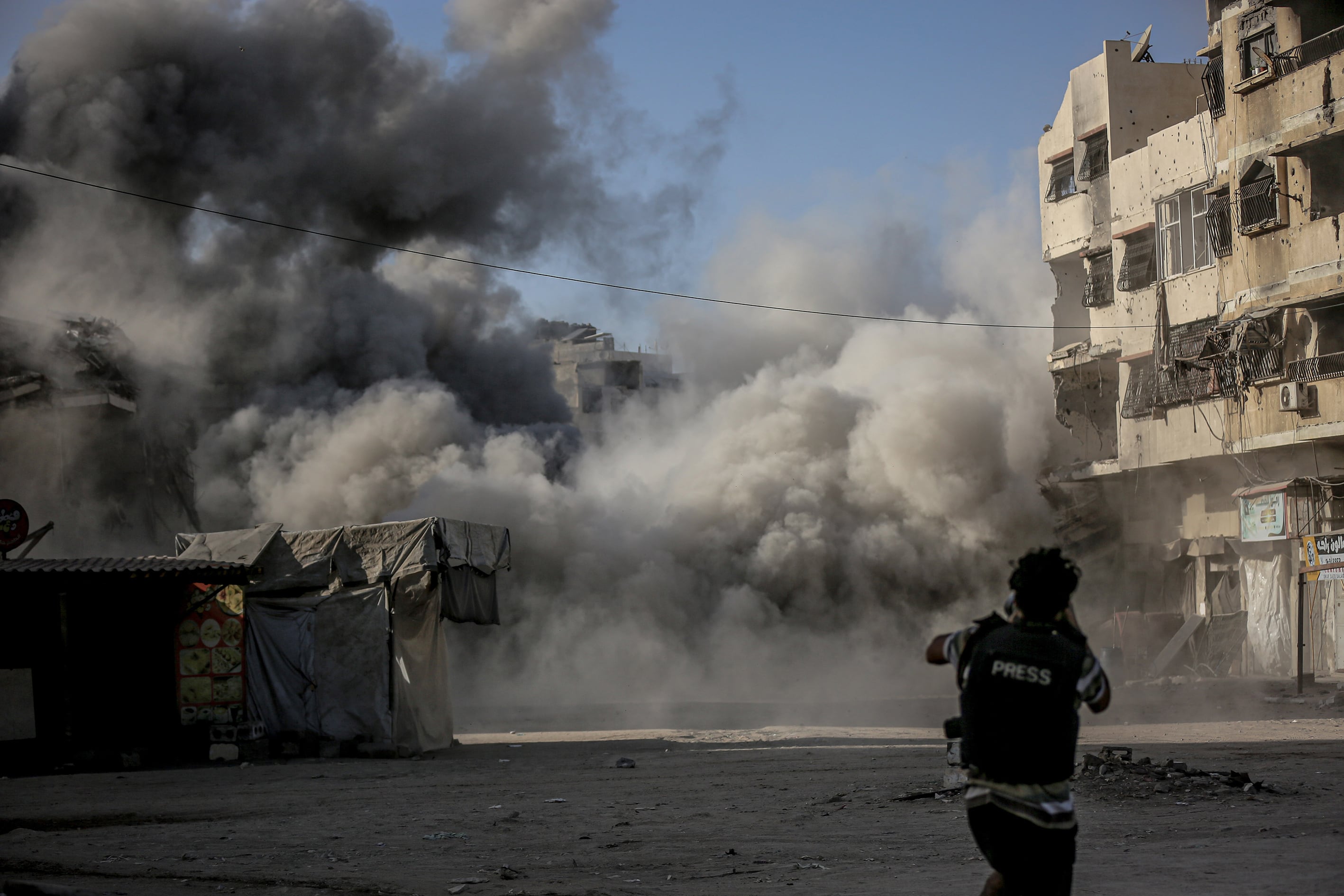 GAZA CITY, GAZA - OCTOBER 3: Explosion is seen following the Israeli attack on Omar al-Mukhtar Street of Gaza City, Gaza on October 3, 2025. (Photo by Saeed M. M. T. Jaras/Anadolu via Getty Images)