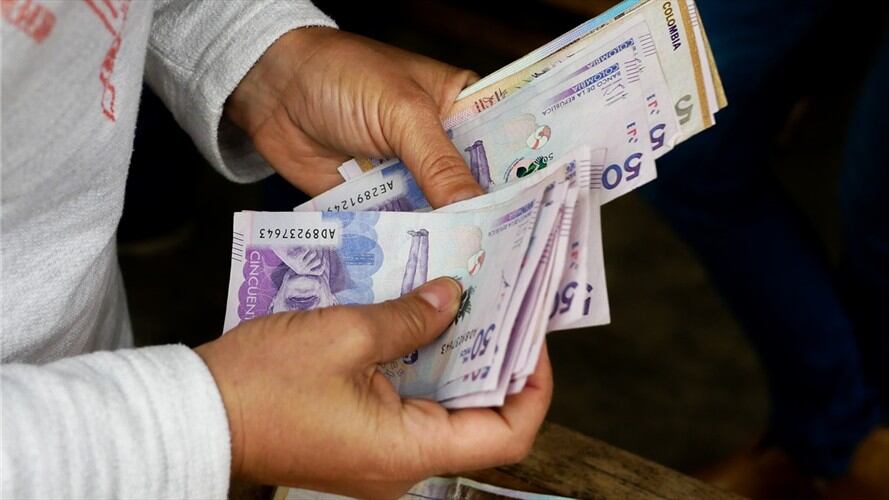 La entrega de pagos acumulados de enero y febrero de Ingreso Solidario beneficiará a más de tres millones de hogares bancarizados. Foto: Getty Images / RICARDO VALLEJO