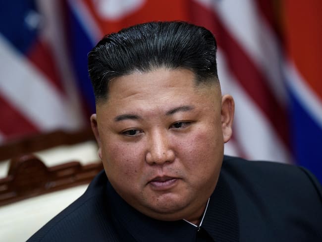TOPSHOT - North Korea&#039;s leader Kim Jong Un before a meeting with  US President Donald Trump on the south side of the Military Demarcation Line that divides North and South Korea, in the Joint Security Area (JSA) of Panmunjom in the Demilitarized zone (DMZ) on June 30, 2019. (Photo by Brendan Smialowski / AFP)        (Photo credit should read BRENDAN SMIALOWSKI/AFP via Getty Images)