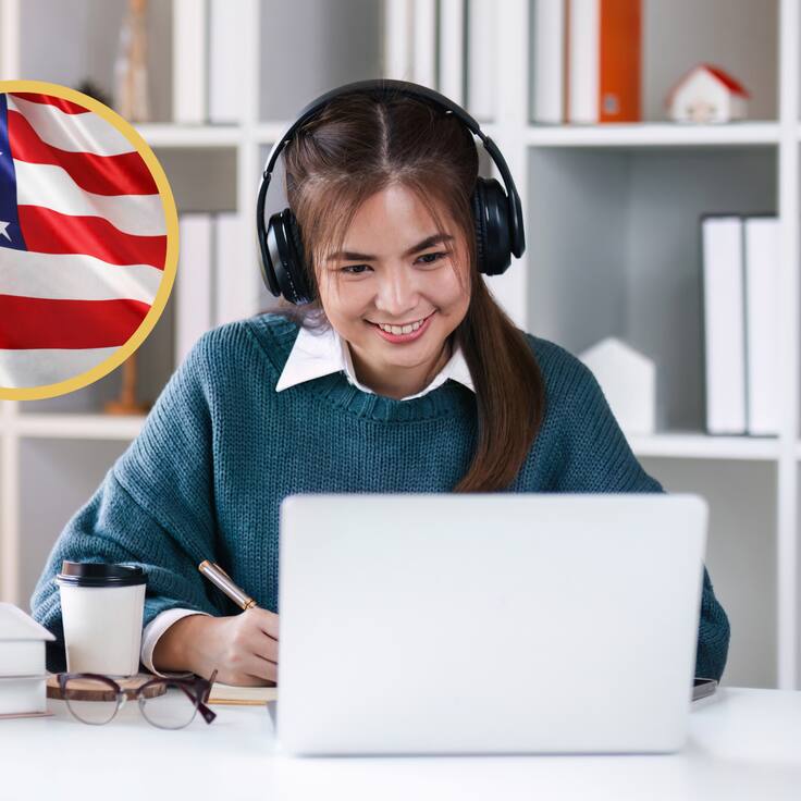 Mujer estudiando inglés en su computador. En el círculo, bandera de Estados Unidos (GettyImages)