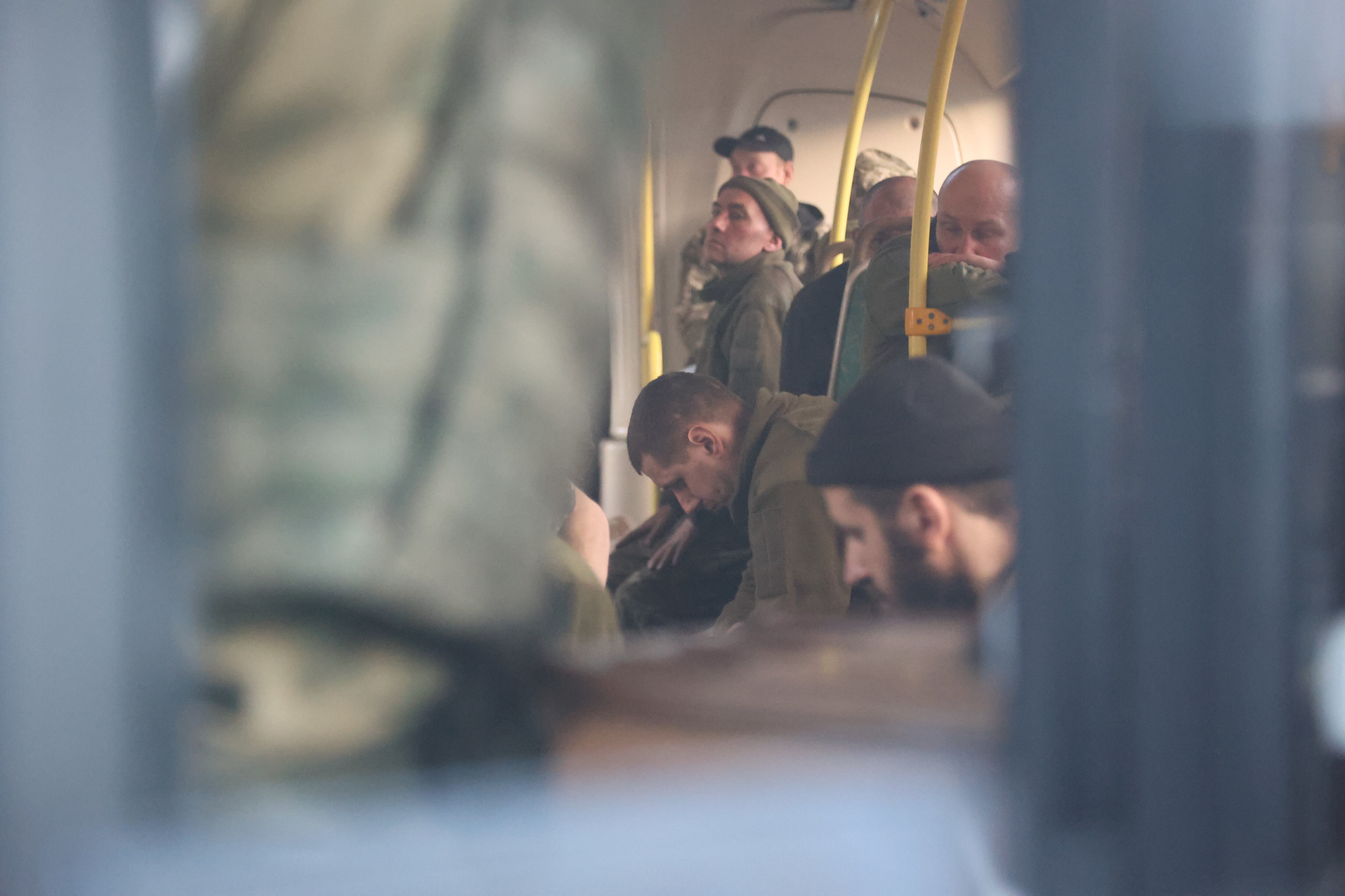 MARIUPOL, UKRAINE - MAY 17: Surrendered servicemen of Ukraine's national battalion "Azov", which is an all-volunteer infantry military unit, are being transferred to Yelenovka in Mariupol, Ukraine on May 17, 2022. (Photo by Leon Klein/Anadolu Agency via Getty Images)