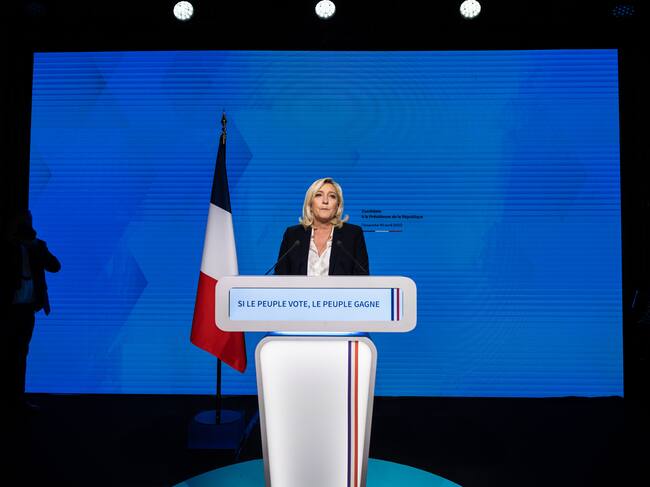 PARIS, FRANCE - APRIL 10: French presidential candidate Marine Le Pen speaks during an election night event after the first round of voting on April 10, 2022 in Paris, France. Nearly 50 million French people will be called to the polls in France for the first round of the presidential election on April 10. Of the 12 candidates, recent polls cast a tight call between outgoing President Emmanuel Macron and his far-right rival Marine Le Pen. (Photo by Louise Delmotte/Getty Images)