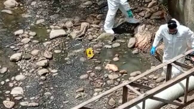 Cuerpo desmembrado. Foto:Tomada del video.