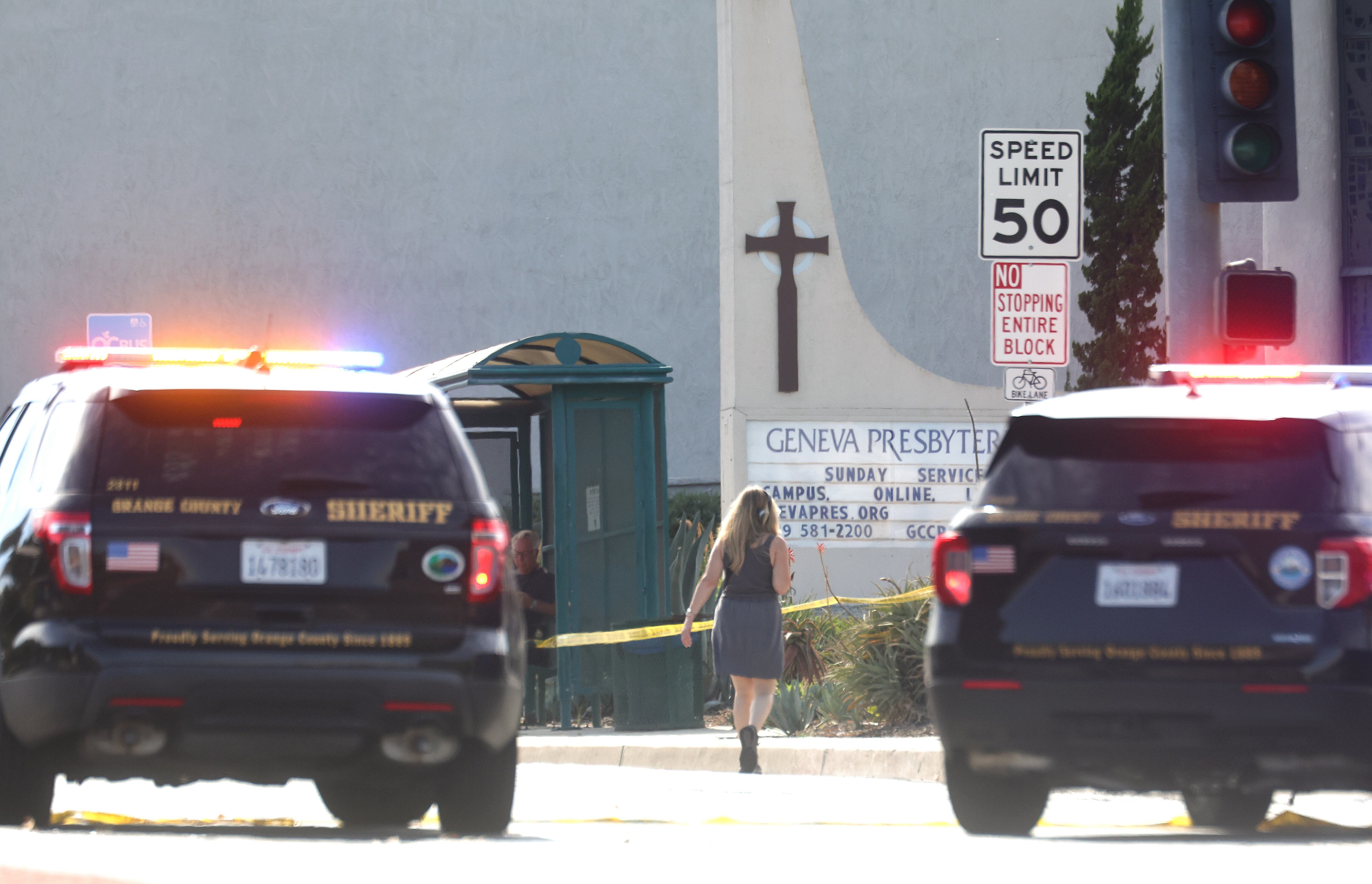 LAGUNA WOODS, CALIFORNIA - MAY 15: Police vehicles are parked near the scene of a shooting at the Geneva Presbyterian Church on May 15, 2022 in Laguna Woods, California. According to police, the shooting left one person dead, four critically wounded, and one with minor injuries. (Photo by Mario Tama/Getty Images)