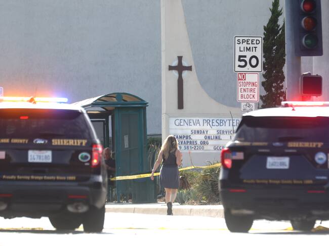 LAGUNA WOODS, CALIFORNIA - MAY 15: Police vehicles are parked near the scene of a shooting at the Geneva Presbyterian Church on May 15, 2022 in Laguna Woods, California. According to police, the shooting left one person dead, four critically wounded, and one with minor injuries. (Photo by Mario Tama/Getty Images)