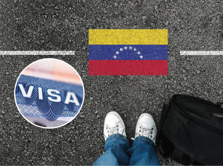 Persona viajera de Venezuela con su maleta de viaje / Visa (Getty Images)