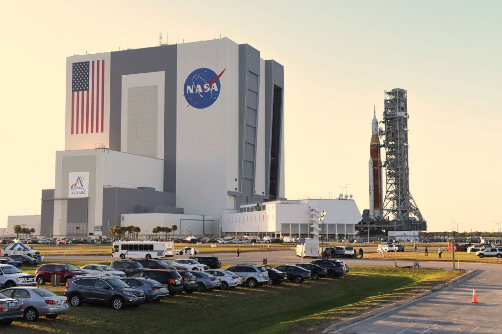 CAPE CANAVERAL, FLORIDA, UNITED STATES - MARCH 17: NASAâs SLS moon megarocket topped by the Orion spacecraft rolls out of the Vehicle Assembly Building at the Kennedy Space Center on its way to launch complex 39B for a launch rehearsal on March 17, 2022 in Cape Canaveral, Florida. NASAâs Artemis 1 moon mission will send an uncrewed Orion spacecraft into orbit around the moon before a splashdown in the Pacific Ocean. The test launch is scheduled for no earlier than May 2022, with NASA hoping to send the next astronauts to the moon no earlier than 2025. (Photo by Paul Hennessy/Anadolu Agency via Getty Images)