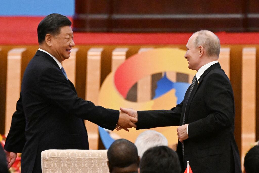 Xi Jinping y Vladimir Putin. (Foto: PEDRO PARDO/AFP via Getty Images)