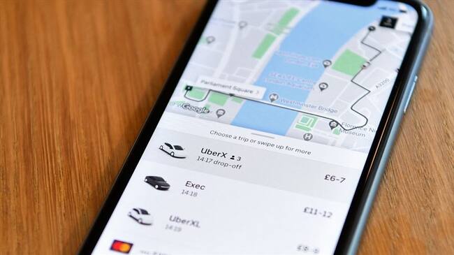 El Tribunal Supremo dio la razón a los conductores de Uber, que estimaban que merecían el estatuto de empleados. . Foto: Ben STANSALL / AFP