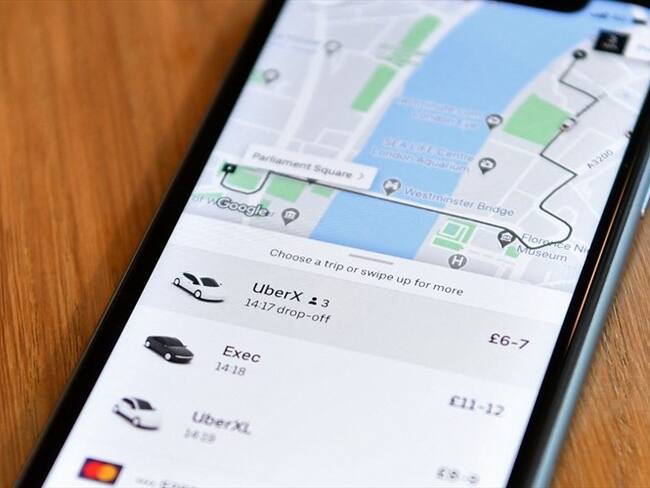 El Tribunal Supremo dio la razón a los conductores de Uber, que estimaban que merecían el estatuto de empleados. . Foto: Ben STANSALL / AFP