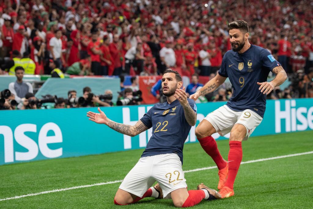 AL KHOR, QATAR - DECEMBER 14: Theo Hernandez of France (L) celebrates scoring the opening goal with Olivier Giroud of France (R) during the FIFA World Cup Qatar 2022 semi final match between France and Morocco at Al Bayt Stadium on December 14, 2022 in Al Khor, Qatar. (Photo by Sebastian Frej/MB Media/Getty Images)