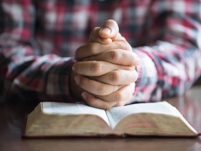 A man reading the Holy Bible.
