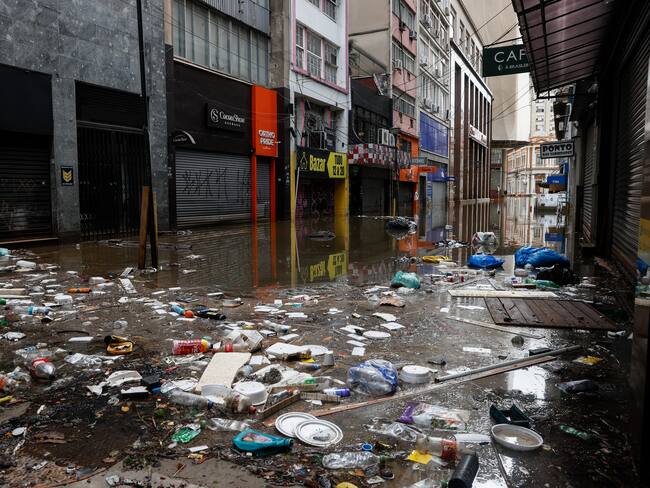 Photograph showing a flooded street with water and garbage in the commercial center of Porto Alegre, Brazil, 13 May 2024. The Brazilian city of Porto Alegre has been flooded for ten consecutive days, and it is highly likely that its situation will worsen due to a new rise in the Guaíba River, which could reach a new record level on Tuesday, as warned by local authorities. The heavy rains in southern Brazil in recent days have caused the river to rise again, reaching 4.94 meters on Monday, exceeding the previous record of 4.76 meters which was recorded until last week, and had only been reached once before in 1941. EFE/Sebastião Moreira
