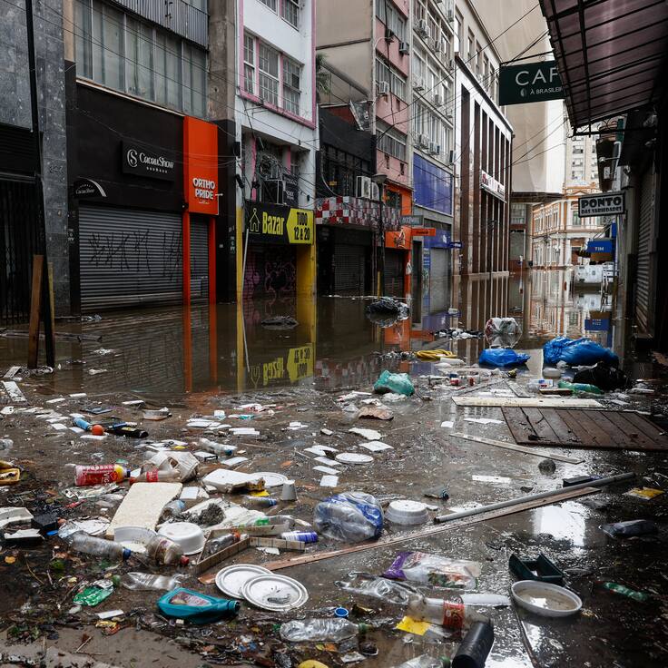 Photograph showing a flooded street with water and garbage in the commercial center of Porto Alegre, Brazil, 13 May 2024. The Brazilian city of Porto Alegre has been flooded for ten consecutive days, and it is highly likely that its situation will worsen due to a new rise in the Guaíba River, which could reach a new record level on Tuesday, as warned by local authorities. The heavy rains in southern Brazil in recent days have caused the river to rise again, reaching 4.94 meters on Monday, exceeding the previous record of 4.76 meters which was recorded until last week, and had only been reached once before in 1941. EFE/Sebastião Moreira