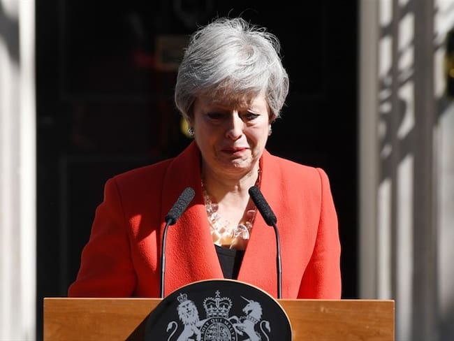 Theresa May informó de que ha comunicado a la reina Isabel II su decisión y que continuará como primera ministra en funciones hasta que el proceso de sucesión quede completado. Foto: Getty Images