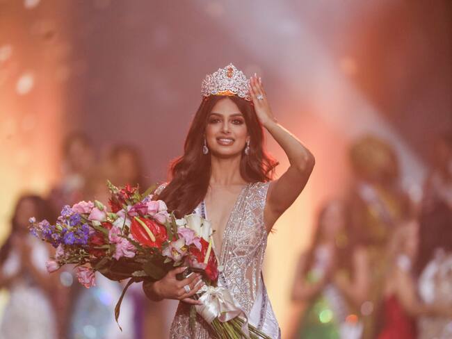 13 December 2021, Israel, Eilat: Miss India Harnaaz Sandhu reacts as she being crowned as Miss Universe during the 70th Miss Universe beauty pageant in Israel's southern Red Sea coastal city of Eilat. Photo: Ilia Yefimovich/dpa (Photo by Ilia Yefimovich/picture alliance via Getty Images)