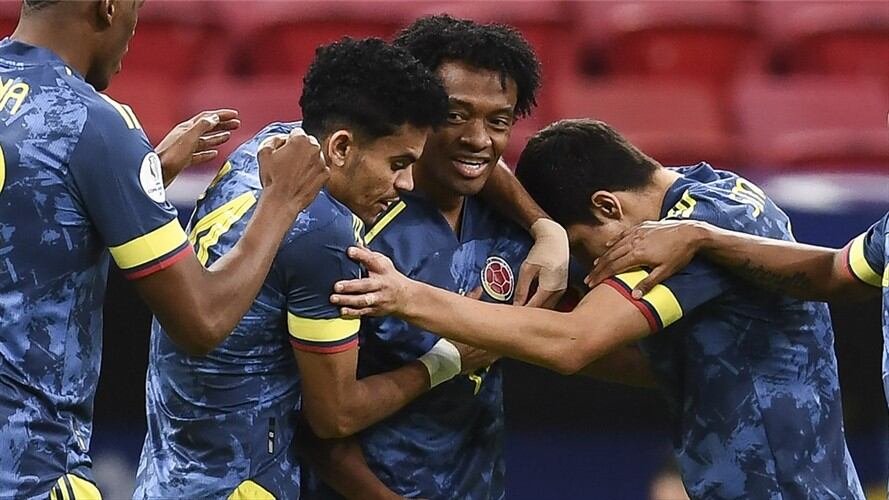 Juan Guillermo Cuadrado, Luis Díaz y Stefan Medina, jugadores de la Selección Colombia. Foto: EVARISTO SA/AFP via Getty Images