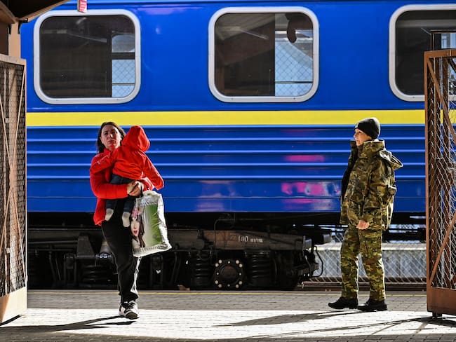 PREZEMYSL, POLAND - MARCH 27: People, mainly women and children, arrive at Przemysl on a train from Odesa station after journeying from war-torn Ukraine on March 27, 2022 in Prezemyls, Poland. Poland has received almost two thirds of the more than 3.5 million people who fled Ukraine after the Feb. 24 invasion by Russia. (Photo by Jeff J Mitchell/Getty Images)