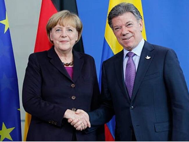 Juan Manuel Santos y Ángela Merkel. Foto: Getty Images