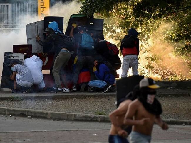 No nos rendimos y no paramos hasta que no se acabe el fuego: manifestante en Cali