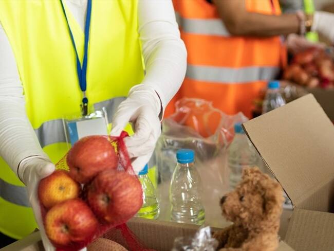 Imagen de referencia de trabajo comunitario. Foto: Getty Images / Vladimir Vladimirov