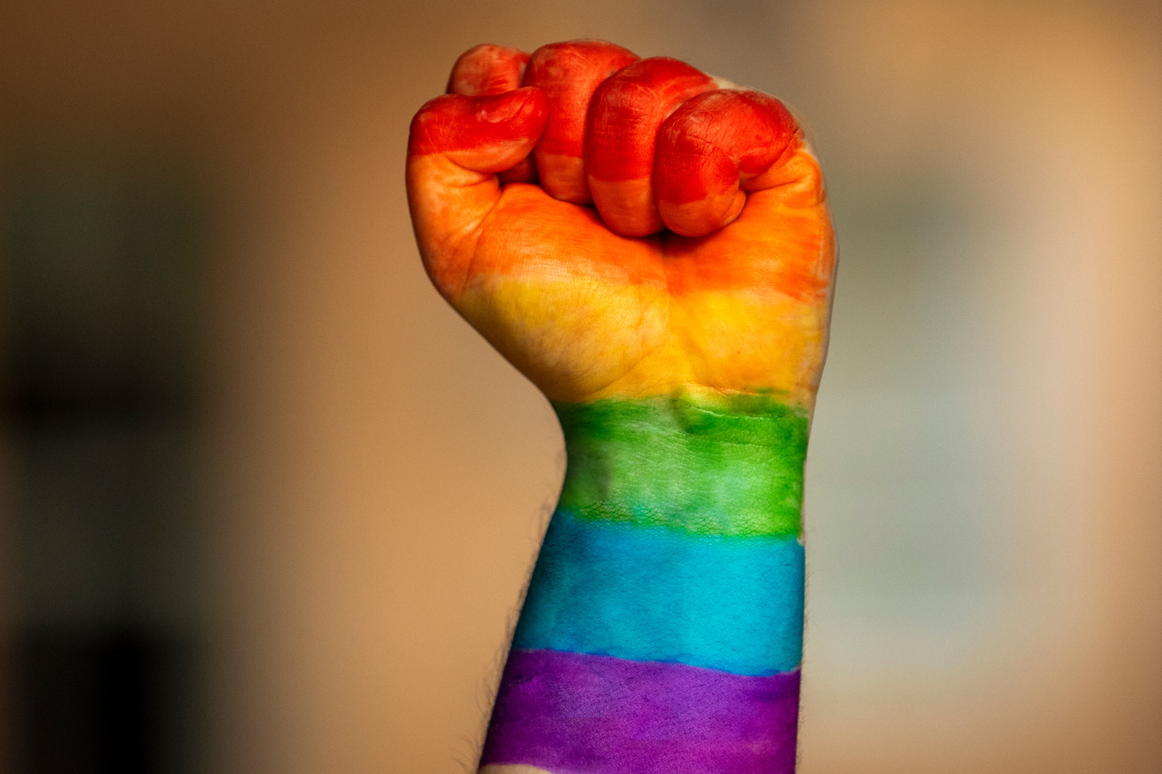 Woman raises a fist while marching against protests for a homophobic attack in A Coruña, Galicia. Spain. July, 6, 2021. Photo: Getty Images