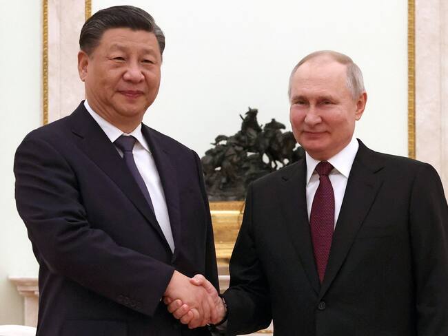 Xi Jinping y Vladimir Putin AFP. (Photo by SERGEI KARPUKHIN/SPUTNIK/AFP via Getty Images)