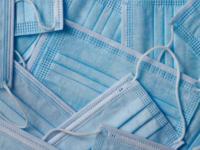 La SIC pidió el soporte de la sugerencia realizada para privilegiar el uso de los tapabocas quirúrgicos. Foto: Getty Images / ALICIA LLOP