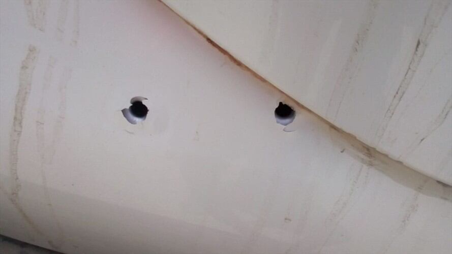 La camioneta de la UNP fue impactada con disparos de fusil . Foto: Acin