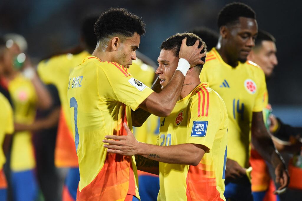 Luis Díaz y Juan Fernando Quintero. (Photo by DANTE FERNANDEZ/AFP via Getty Images)