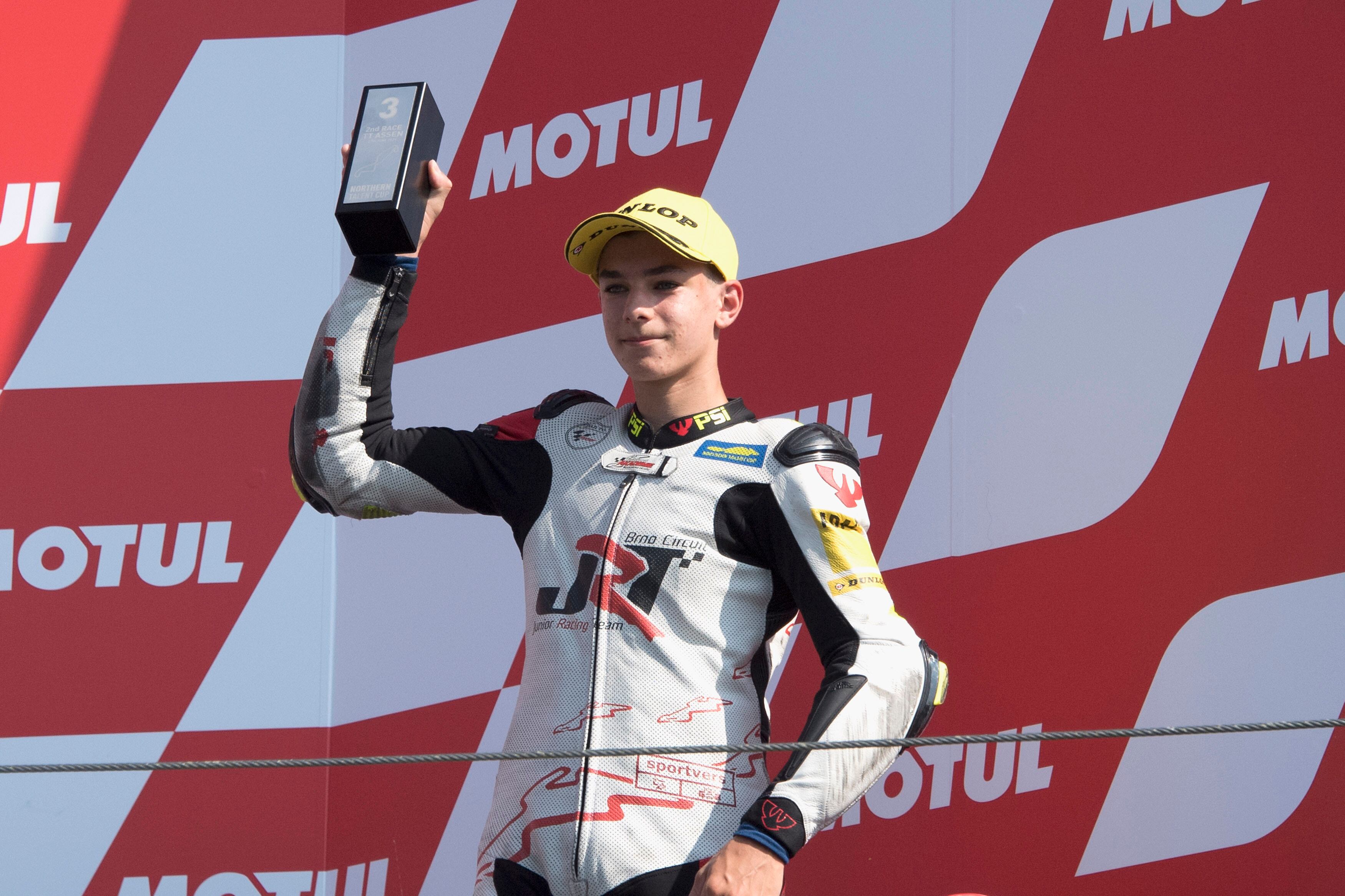 ASSEN, NETHERLANDS - JUNE 27:  Jakub Gurecky of Czech Rep. and Northern Talent Cup celebrates the third place on the podium during the Northern Talent Cup race 2 during the MotoGP of Netherlands - Race at TT Circuit Assen on June 27, 2021 in Assen, Netherlands. (Photo by Mirco Lazzari gp/Getty Images)