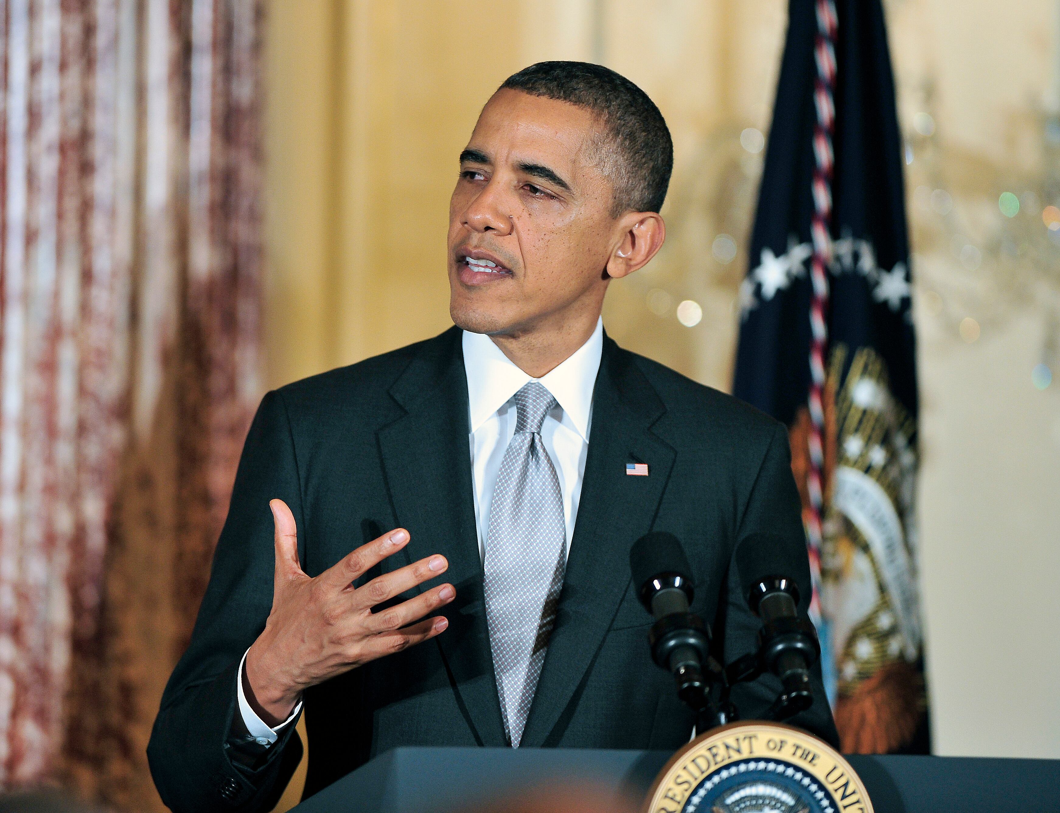 WASHINGTON, DC - DECEMBER 12: U.S. President Barack Obama delivers remarks at the Diplomatic Corps Holiday Reception on December 19, 2012 in Washington, D.C. President Obama announced that he is making an administration-wide effort to solve gun violence and has tapped Vice President Joseph Biden to lead the effort in the wake of the Sandy Hook Elementary School shooting in Newtown, Connecticut. (Photo by Ron Sachs-Pool/Getty Images)