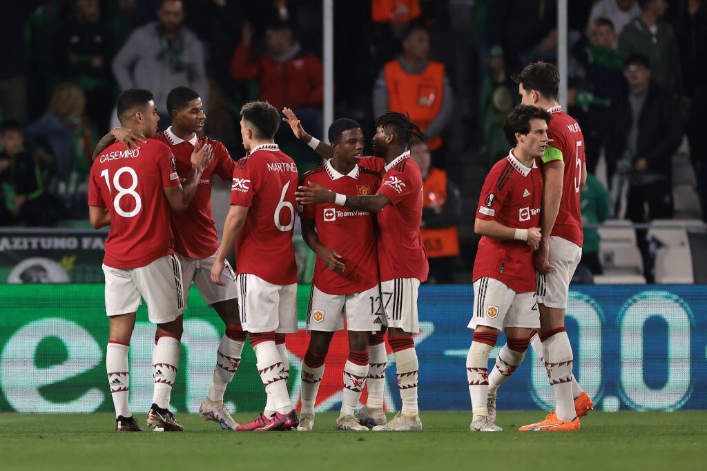 SEVILLE, SPAIN - MARCH 16: Marcus Rashford of Manchester United celebrates with team mates after scoring to give the side a 1-0 lead during the UEFA Europa League round of 16 leg two match between Real Betis and Manchester United at Estadio Benito Villamarin on March 16, 2023 in Seville, Spain. (Photo by Jonathan Moscrop/Getty Images)