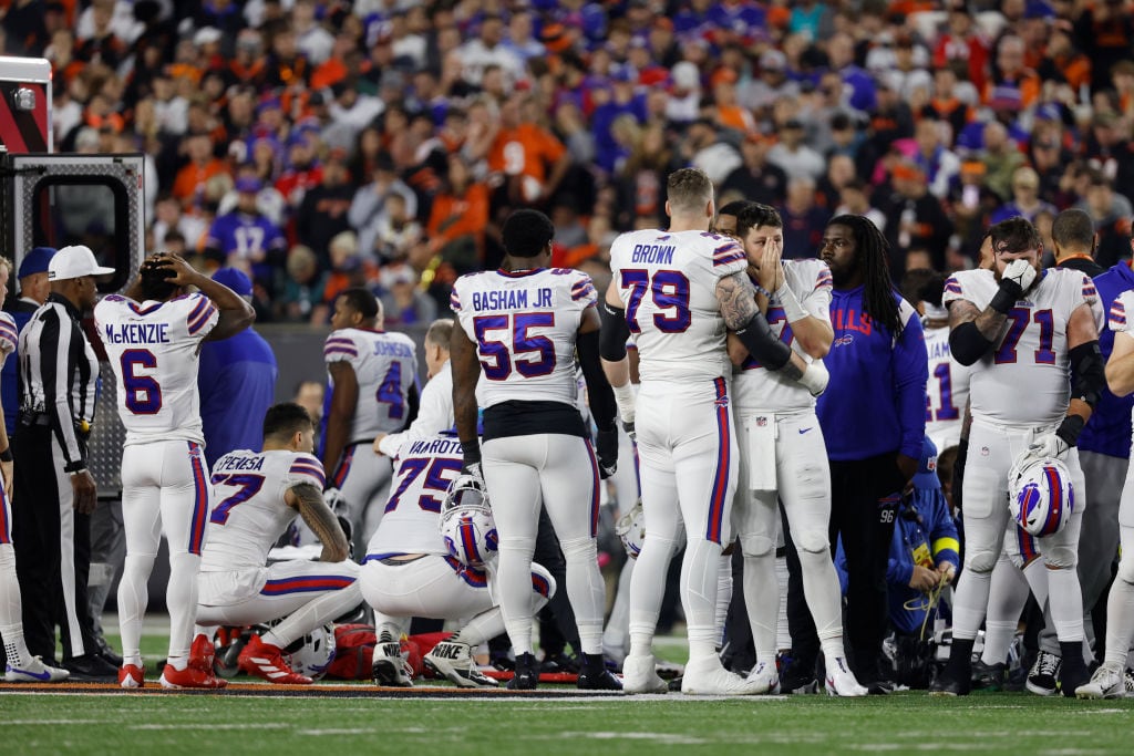 CINCINNATI, OHIO - JANUARY 02: Buffalo Bills players react after teammate Damar Hamlin #3 was injured against the Cincinnati Bengals  (Photo by Kirk Irwin/Getty Images)